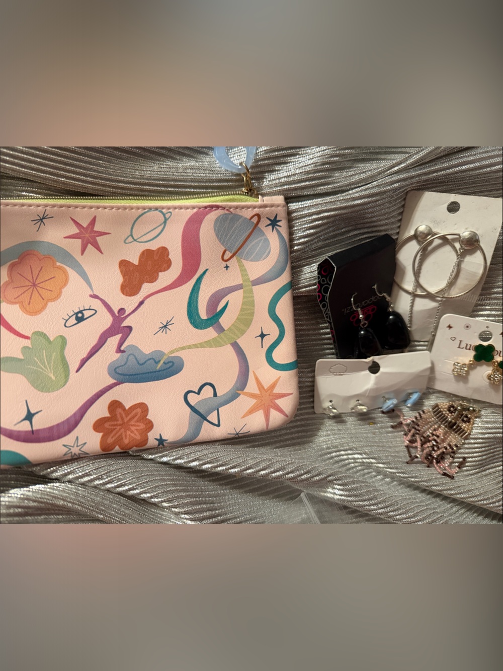 Pink Cosmic Print Zip Pouch filled with 6 pairs earrings